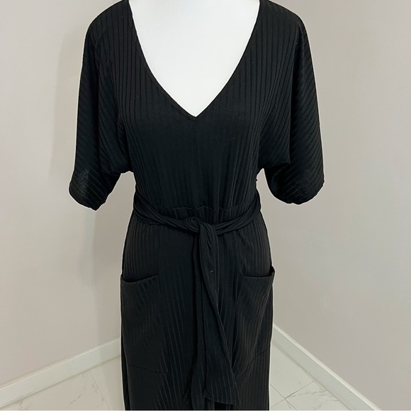 Rolla Coster Plunging Black Wrap Dress with
Flutter Sleeve Size: L - Picture 6 of 16